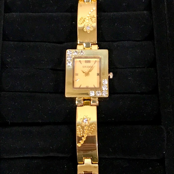 Pak Fook Goldstone watch w/floral-crystal accents. - Picture 4 of 8